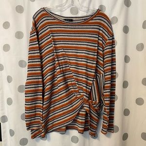 Navy and burnt orange striped top